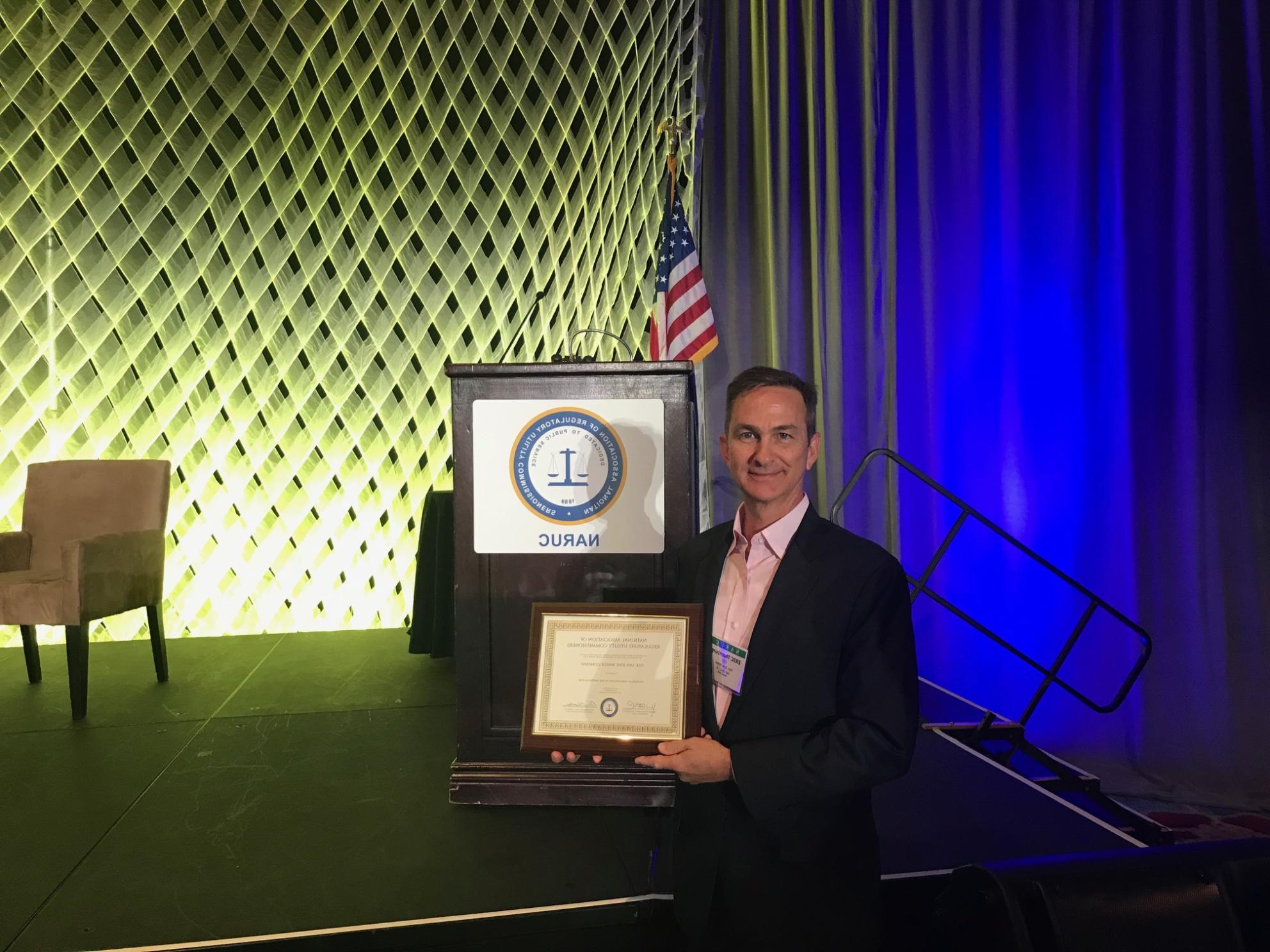 San Jose Water CEO Eric W. Thornburg holding NARUC Award